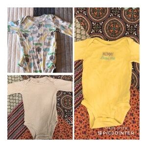 THREE Carter’s long sleeve onesies - 9m